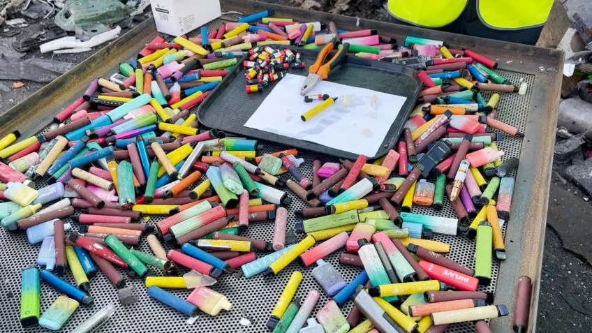 Disposable vape waste problem showing internal components and battery waste